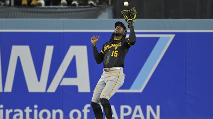 Los Angeles, California, USA; Pittsburgh Pirates center fielder Oneil Cruz (15) catches a pop out from Los Angeles Dodgers designated hitter Shohei Ohtani (17) in the eighth inning at Dodger Stadium. Los Angeles, California, USA; Pittsburgh Pirates center fielder Oneil Cruz (15) catches a pop out from Los Angeles Dodgers designated hitter Shohei Ohtani (17) in the eighth inning at Dodger Stadium.