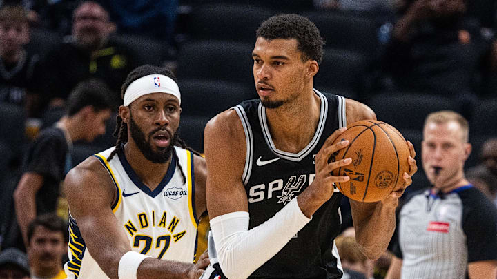 Oct 13, 2025; Indianapolis, Indiana, USA; San Antonio Spurs forward/center Victor Wembanyama (1) holds the ball while Indiana Pacers forward Isaiah Jackson (22) defends in the first half at Gainbridge Fieldhouse. Mandatory Credit: Trevor Ruszkowski-Imagn Images Oct 13, 2025; Indianapolis, Indiana, USA; San Antonio Spurs forward/center Victor Wembanyama (1) holds the ball while Indiana Pacers forward Isaiah Jackson (22) defends in the first half at Gainbridge Fieldhouse. Mandatory Credit: Trevor Ruszkowski-Imagn Images