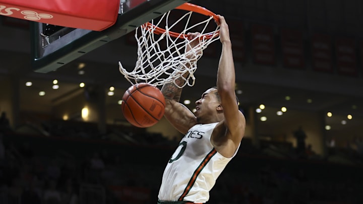 Jan 10, 2024; Coral Gables, Florida, USA; Miami Hurricanes guard Matthew Cleveland (0) dunks the