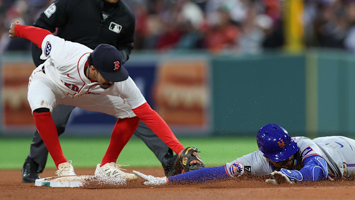 May 20, 2025; Boston, Massachusetts, USA; New York Mets designated hitter Mark Vientos (27) slides past Boston Red Sox second baseman David Hamilton (17) during the fourth inning at Fenway Park. Mandatory Credit: Paul Rutherford-Imagn Images May 20, 2025; Boston, Massachusetts, USA; New York Mets designated hitter Mark Vientos (27) slides past Boston Red Sox second baseman David Hamilton (17) during the fourth inning at Fenway Park. Mandatory Credit: Paul Rutherford-Imagn Images