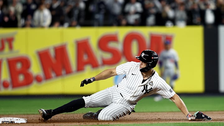 New York Yankees designated hitter Giancarlo Stanton (27) slides into second with a double during the fourth inning against the Los Angeles Dodgers in game three of the 2024 MLB World Series at Yankee Stadium. New York Yankees designated hitter Giancarlo Stanton (27) slides into second with a double during the fourth inning against the Los Angeles Dodgers in game three of the 2024 MLB World Series at Yankee Stadium.