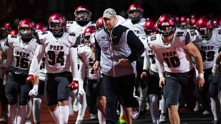 St. Joseph's Prep head coach Tim Roken and the Hawks take the field to play in the PIAA Class 6A football championship game against Central Catholic at Cumberland Valley High School, Saturday, Dec. 7, 2024, in Silver Spring Township, Pa.