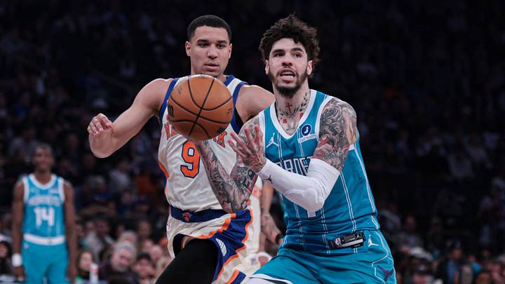 Charlotte Hornets guard LaMelo Ball (1) drives to the basket against New York Knicks guard Kevin McCullar Jr. Charlotte Hornets guard LaMelo Ball (1) drives to the basket against New York Knicks guard Kevin McCullar Jr.