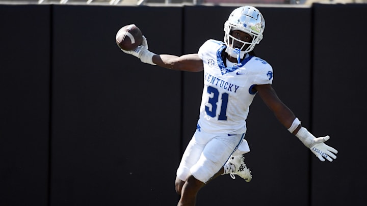 Sep 23, 2023; Nashville, Tennessee, USA; Kentucky Wildcats defensive back Maxwell Hairston (31) celebrates after after scoring his second touchdown on an interception against the Vanderbilt Commodores at FirstBank Stadium. Mandatory Credit: Christopher Hanewinckel-USA TODAY Sports