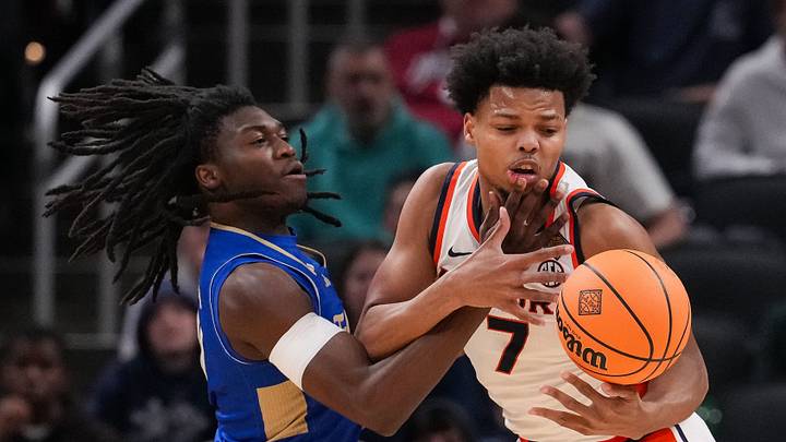 Auburn Tigers guard Keyshawn Hall (7) ball is tipped away by Tulsa Golden Hurricane guard Ade Popoola (0) on Sunday, April 5, 2026, during the NIT men's basketball championship game at Gainbridge Fieldhouse in Indianapolis. Auburn Tigers guard Keyshawn Hall (7) ball is tipped away by Tulsa Golden Hurricane guard Ade Popoola (0) on Sunday, April 5, 2026, during the NIT men's basketball championship game at Gainbridge Fieldhouse in Indianapolis.
