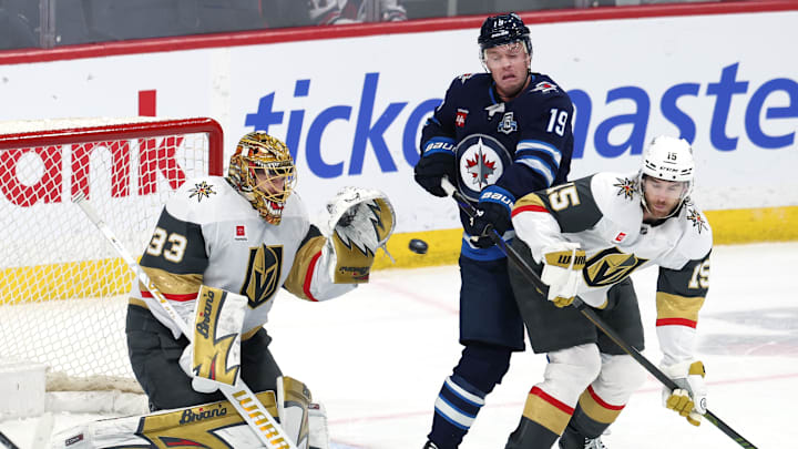 Adin Hill, Jonathan Toews, and Noah Hanifin during the third period Adin Hill, Jonathan Toews, and Noah Hanifin during the third period