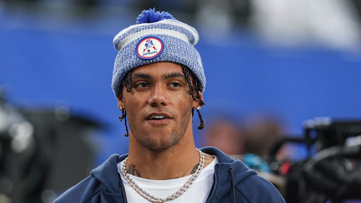 Aug 21, 2025; East Rutherford, New Jersey, USA; New England Patriots cornerback Christian Gonzalez (0) on the field before the preseason game against the New York Giants at MetLife Stadium. Mandatory Credit: Vincent Carchietta-Imagn Images