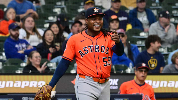 May 7, 2025; Milwaukee, Wisconsin, USA;  Houston Astros starting pitcher Framber Valdez (59) reacts after throwing out Milwaukee Brewers third baseman Vinny Capra in the seventh inning at American Family Field.