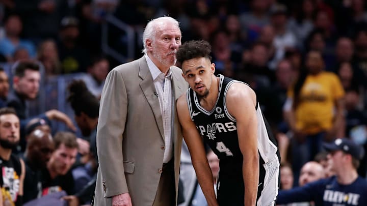 Apr 16, 2019; Denver, CO, USA; San Antonio Spurs head coach Gregg Popovich talks with guard Derrick White (4) in the second quarter against the Denver Nuggets in game two of the first round of the 2019 NBA Playoffs at the Pepsi Center. Mandatory Credit: Isaiah J. Downing-Imagn Images Apr 16, 2019; Denver, CO, USA; San Antonio Spurs head coach Gregg Popovich talks with guard Derrick White (4) in the second quarter against the Denver Nuggets in game two of the first round of the 2019 NBA Playoffs at the Pepsi Center. Mandatory Credit: Isaiah J. Downing-Imagn Images