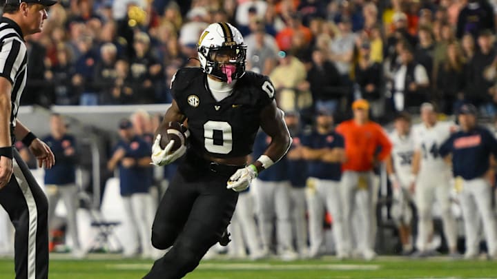 Nov 8, 2025; Nashville, Tennessee, USA; Vanderbilt Commodores wide receiver Junior Sherrill (0) runs with the ball after a made catch against the Auburn Tigers during the overtime period at FirstBank Stadium. Mandatory Credit: Steve Roberts-Imagn Images Nov 8, 2025; Nashville, Tennessee, USA; Vanderbilt Commodores wide receiver Junior Sherrill (0) runs with the ball after a made catch against the Auburn Tigers during the overtime period at FirstBank Stadium. Mandatory Credit: Steve Roberts-Imagn Images