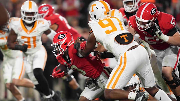Georgia running back Nate Frazier (3) runs the ballduring a college football game between Tennessee and Georgia at Sanford Stadium in Athens, Ga., on Saturday, November 16, 2024.