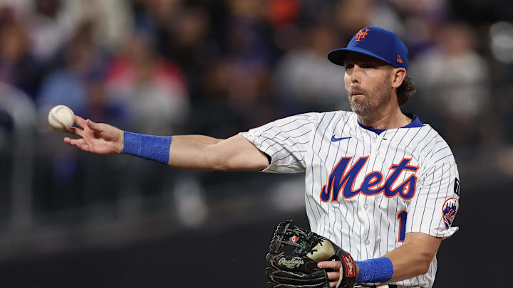 Sep 17, 2025; New York City, New York, USA; New York Mets second baseman Jeff McNeil (1) throws the ball to first base for an out during the sixth inning against the San Diego Padres at Citi Field. Mandatory Credit: Vincent Carchietta-Imagn Images