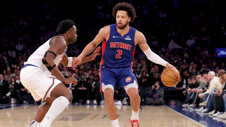 Jan 13, 2025; New York, New York, USA; Detroit Pistons guard Cade Cunningham (2) controls the ball against New York Knicks forward OG Anunoby (8) during the third quarter at Madison Square Garden. Mandatory Credit: Brad Penner-Imagn Images