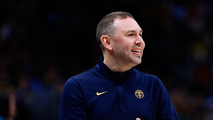 Feb 1, 2026; Denver, Colorado, USA; Denver Nuggets head coach David Adelman reacts in the first quarter against the Oklahoma City Thunder at Ball Arena.