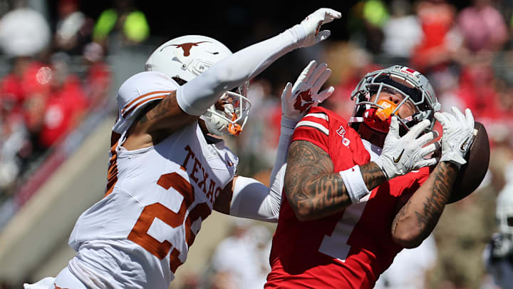 Aug 30, 2025; Columbus, Ohio, USA; Ohio State Buckeyes wide receiver Brandon Inniss (1) attempts to make a catch over Texas Longhorns defensive back Graceson Littleton (29) in the first half at Ohio Stadium. Mandatory Credit: Joseph Maiorana-Imagn Images Aug 30, 2025; Columbus, Ohio, USA; Ohio State Buckeyes wide receiver Brandon Inniss (1) attempts to make a catch over Texas Longhorns defensive back Graceson Littleton (29) in the first half at Ohio Stadium. Mandatory Credit: Joseph Maiorana-Imagn Images