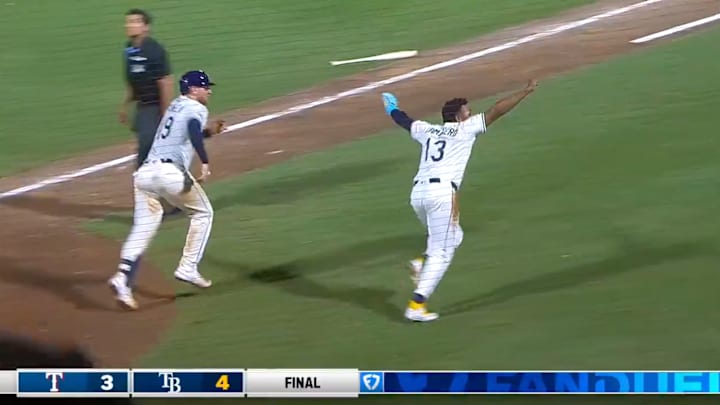 Caminero celebrates scoring the game-winning run as the Rays beat the Rangers 4-3.