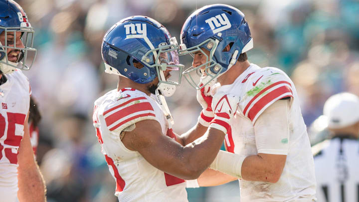 Oct 23, 2022; Jacksonville, Florida, USA; New York Giants quarterback Daniel jones (8) and running