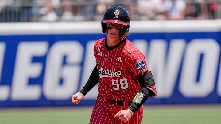 Nebraska pitcher Jordyn Frahm (98) hits a home run in the first inning during a softball game at the Women’s College World Series between Texas and Nebraska at Devon Park in Oklahoma City, on Sunday, May 31, 2026. Nebraska pitcher Jordyn Frahm (98) hits a home run in the first inning during a softball game at the Women’s College World Series between Texas and Nebraska at Devon Park in Oklahoma City, on Sunday, May 31, 2026.