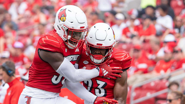 Louisville Cardinals celebrate a play during their game against the Austin Peay Governors on Saturday, Aug. 31, 2024 at L&N Federal Credit Union Stadium in Louisville, Ky.