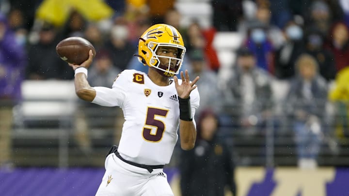 Nov 13, 2021; Seattle, Washington, USA; Arizona State Sun Devils quarterback Jayden Daniels (5) passes against the Washington Huskies during the first quarter at Alaska Airlines Field at Husky Stadium. Mandatory Credit: Joe Nicholson-Imagn Images