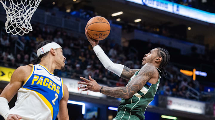 Dec 23, 2025; Indianapolis, Indiana, USA; Milwaukee Bucks guard/forward Kevin Porter Jr. (7) shoots the ball while Indiana Pacers guard/forward Andrew Nembhard (2) defends in the second half at Gainbridge Fieldhouse. Mandatory Credit: Trevor Ruszkowski-Imagn Images Dec 23, 2025; Indianapolis, Indiana, USA; Milwaukee Bucks guard/forward Kevin Porter Jr. (7) shoots the ball while Indiana Pacers guard/forward Andrew Nembhard (2) defends in the second half at Gainbridge Fieldhouse. Mandatory Credit: Trevor Ruszkowski-Imagn Images