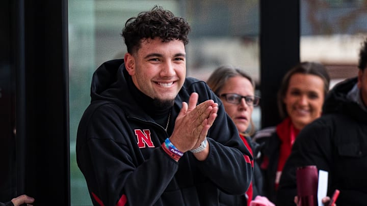 Lincoln, Nebraska, USA; Nebraska Cornhuskers quarterback Dylan Raiola (15) greets the team as the walk into the stadium before the game against the Iowa Hawkeyes at Memorial Stadium.