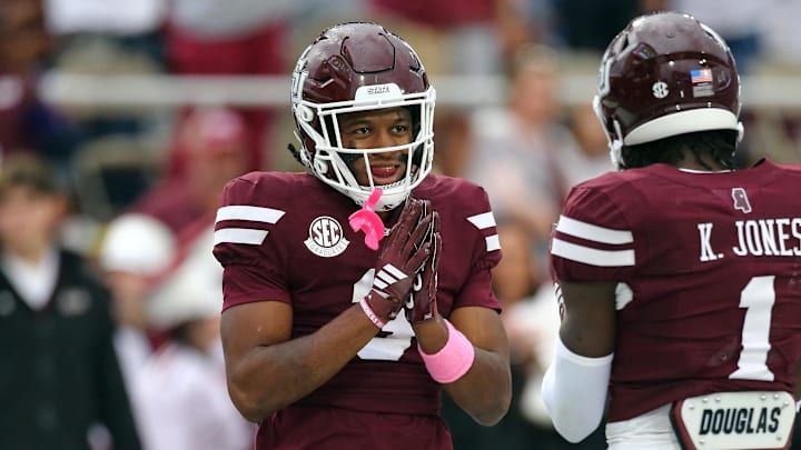 Mississippi State Bulldogs defensive back Brylan Lanier (3) reacts with defensive back Kelley Jones (1) after a pass breakup during the second quarter against the Texas Longhorns at Davis Wade Stadium at Scott Field.