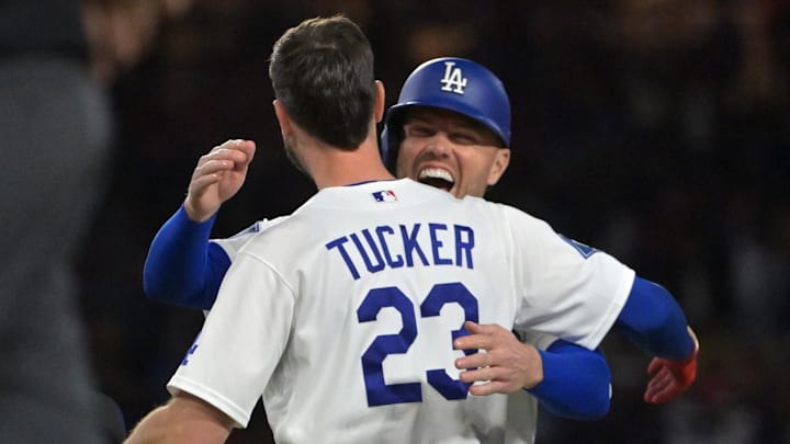 Apr 27, 2026; Los Angeles, California, USA; Los Angeles Dodgers right fielder Kyle Tucker (23) is congratulated by first baseman Freddie Freeman (5) after hitting a 2 RBI walk-off single in the ninth inning to defeat the Miami Marlins at Dodger Stadium. Mandatory Credit: Jayne Kamin-Oncea-Imagn Images