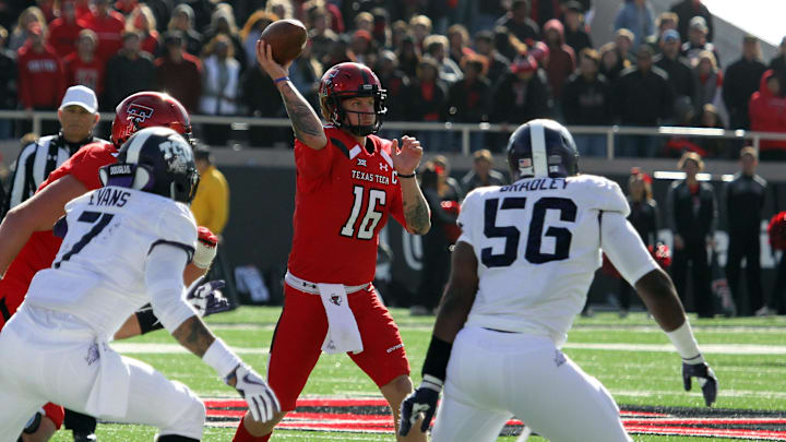 Nov 18, 2017; Lubbock, TX, USA; Texas Tech Red Raiders quarterback Nic Shimonek (16) throws a pass against the TCU Horned Frogs in the first half at Jones AT&T Stadium. Mandatory Credit: Michael C. Johnson-Imagn Images