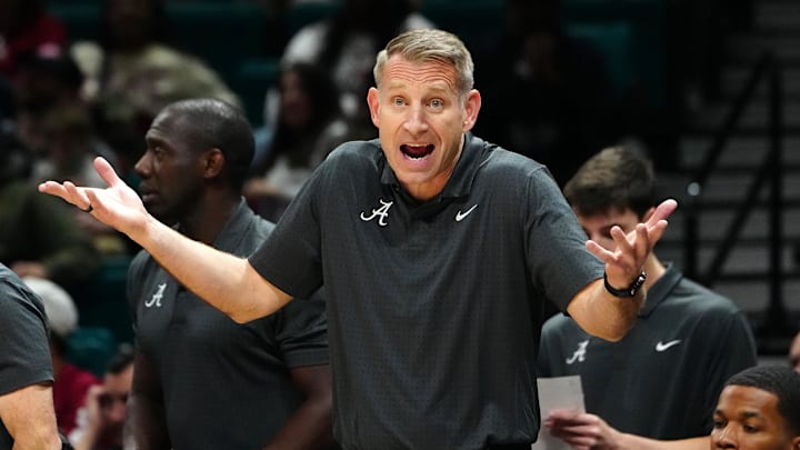 Nov 27, 2024; Las Vegas, Nevada, USA; Alabama Crimson Tide head coach Nate Oats protests a call in favor of the Rutgers Scarlet Knights during the first half at MGM Grand Garden Arena. Mandatory Credit: Stephen R. Sylvanie-Imagn Images Nov 27, 2024; Las Vegas, Nevada, USA; Alabama Crimson Tide head coach Nate Oats protests a call in favor of the Rutgers Scarlet Knights during the first half at MGM Grand Garden Arena. Mandatory Credit: Stephen R. Sylvanie-Imagn Images