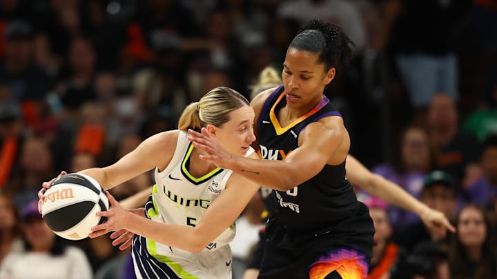 Dallas Wings guard Paige Bueckers against Phoenix Mercury forward Alyssa Thomas.
