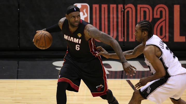 Jun 15, 2014; San Antonio, TX, USA; Miami Heat forward LeBron James (6) shoots against San Antonio Spurs forward Kawhi Leonard (2) in game five of the 2014 NBA Finals at AT&T Center. Mandatory Credit: Soobum Im-Imagn Images Jun 15, 2014; San Antonio, TX, USA; Miami Heat forward LeBron James (6) shoots against San Antonio Spurs forward Kawhi Leonard (2) in game five of the 2014 NBA Finals at AT&T Center. Mandatory Credit: Soobum Im-Imagn Images