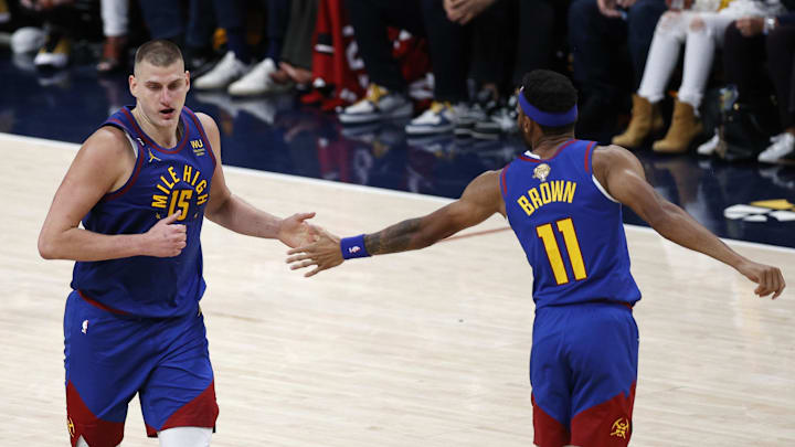 Jun 1, 2023; Denver, CO, USA; Denver Nuggets center Nikola Jokic (15) and forward Bruce Brown (11) celebrate during the second half in game one of the 2023 NBA Finals against the Miami Heat at Ball Arena. Mandatory Credit: Isaiah J. Downing-Imagn Images Jun 1, 2023; Denver, CO, USA; Denver Nuggets center Nikola Jokic (15) and forward Bruce Brown (11) celebrate during the second half in game one of the 2023 NBA Finals against the Miami Heat at Ball Arena. Mandatory Credit: Isaiah J. Downing-Imagn Images