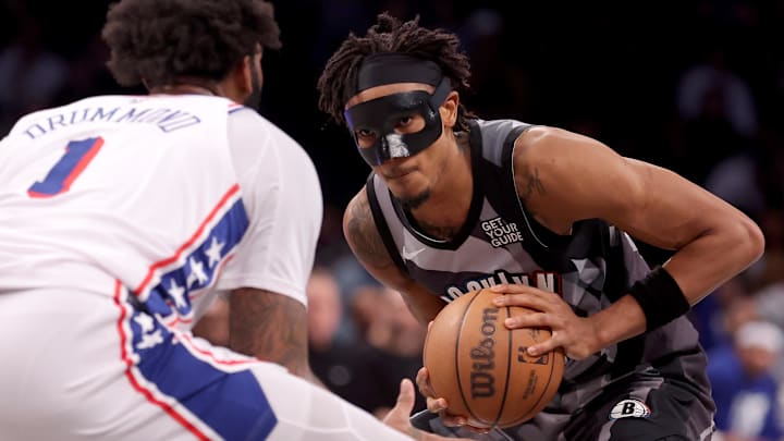 Feb 12, 2025; Brooklyn, New York, USA; Brooklyn Nets center Nic Claxton (33) controls the ball against Philadelphia 76ers center Andre Drummond (1) during the second quarter at Barclays Center. Mandatory Credit: Brad Penner-Imagn Images Feb 12, 2025; Brooklyn, New York, USA; Brooklyn Nets center Nic Claxton (33) controls the ball against Philadelphia 76ers center Andre Drummond (1) during the second quarter at Barclays Center. Mandatory Credit: Brad Penner-Imagn Images
