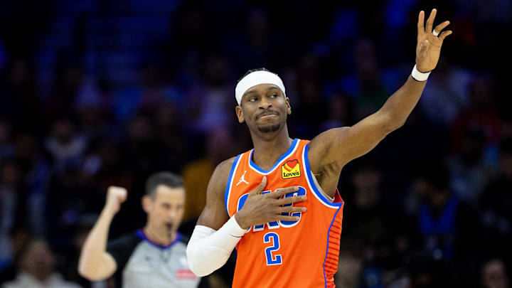 Jan 14, 2025; Philadelphia, Pennsylvania, USA; Oklahoma City Thunder guard Shai Gilgeous-Alexander (2) reacts after being fouled against the Philadelphia 76ers during the first quarter at Wells Fargo Center. Mandatory Credit: Bill Streicher-Imagn Images Jan 14, 2025; Philadelphia, Pennsylvania, USA; Oklahoma City Thunder guard Shai Gilgeous-Alexander (2) reacts after being fouled against the Philadelphia 76ers during the first quarter at Wells Fargo Center. Mandatory Credit: Bill Streicher-Imagn Images