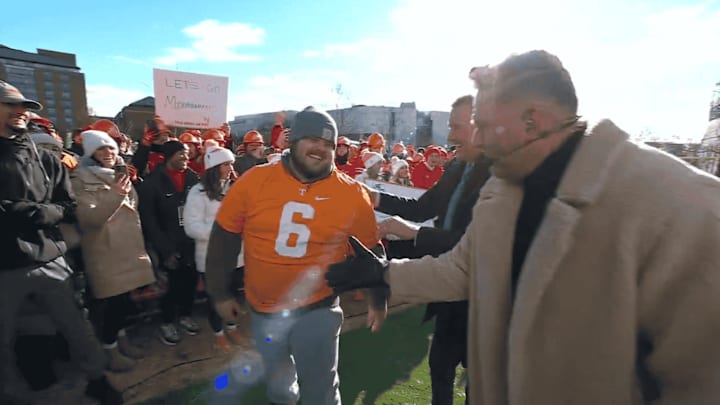 Tennessee fan competes in College GameDay's kicking contest in Columbus before the Tennessee-Ohio State College Football Playoff game.