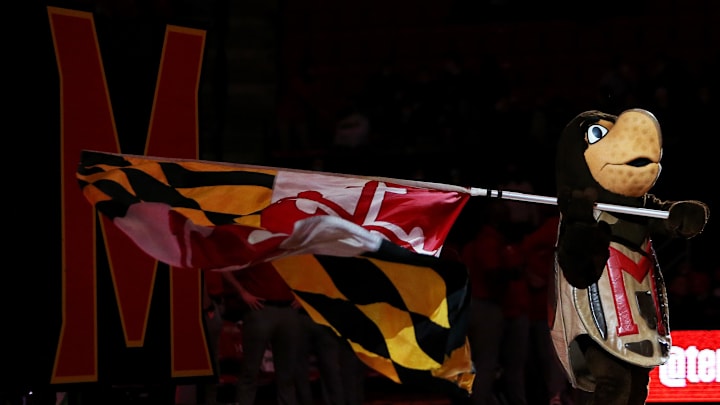 Jan 9, 2022; College Park, Maryland, USA; Maryland Terrapins mascot "Testudo" waives a Maryland flag before a match against the Wisconsin Badgers at the Xfinity Center.