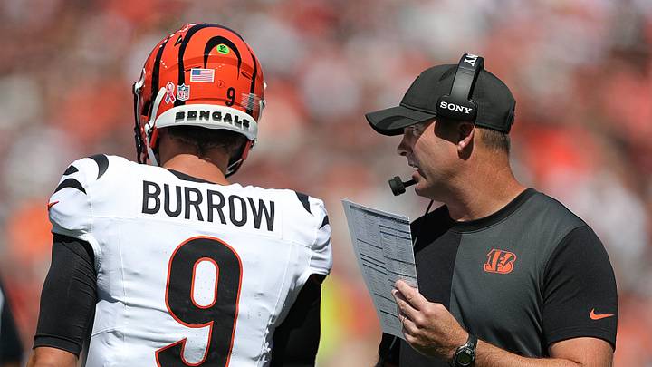 Cincinnati Bengals head coach Zac Taylor, right, has a word with quarterback Joe Burrow (9) during the first half of an NFL football game at Huntington Bank Field, Sept. 7, 2025, in Cleveland, Ohio. Cincinnati Bengals head coach Zac Taylor, right, has a word with quarterback Joe Burrow (9) during the first half of an NFL football game at Huntington Bank Field, Sept. 7, 2025, in Cleveland, Ohio.