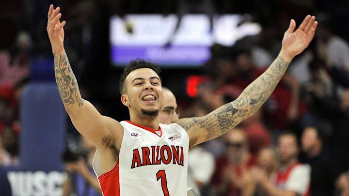 Mar 3, 2016; Tucson, AZ, USA; Arizona Wildcats guard Gabe York (1) signals to the crowd after beating the California Golden Bears at McKale Center. Arizona won 64-61. Mandatory Credit: Casey Sapio-Imagn Images