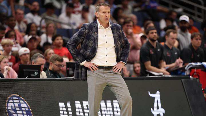 Mar 22, 2026; Tampa, FL, USA; Alabama Crimson Tide head coach Nate Oats looks on against the Texas Tech Red Raiders in the second half during a second round game of the men's 2026 NCAA Tournament at Benchmark International Arena. Mandatory Credit: Matt Pendleton-Imagn Images Mar 22, 2026; Tampa, FL, USA; Alabama Crimson Tide head coach Nate Oats looks on against the Texas Tech Red Raiders in the second half during a second round game of the men's 2026 NCAA Tournament at Benchmark International Arena. Mandatory Credit: Matt Pendleton-Imagn Images