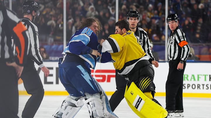 Feb 1, 2026; Tampa Bay, Florida, USA; Tampa Bay Lightning goaltender Andrei Vasilevskiy (88) and Boston Bruins goaltender Jeremy Swayman (1) fight during the second period in the 2026 Stadium Series ice hockey game at Raymond James Stadium. Mandatory Credit: Kim Klement Neitzel-Imagn Images