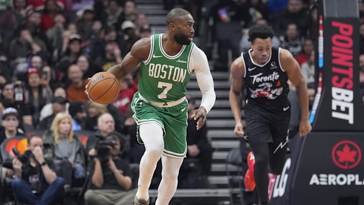 Dec 7, 2025; Toronto, Ontario, CAN; Boston Celtics forward Jaylen Brown (7) dribbles the ball up court as Toronto Raptors guard Scottie Barnes (4) pursues during the first half at Scotiabank Arena. Mandatory Credit: John E. Sokolowski-Imagn Images Dec 7, 2025; Toronto, Ontario, CAN; Boston Celtics forward Jaylen Brown (7) dribbles the ball up court as Toronto Raptors guard Scottie Barnes (4) pursues during the first half at Scotiabank Arena. Mandatory Credit: John E. Sokolowski-Imagn Images