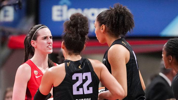 Indiana Fever guard Caitlin Clark (22) and Golden State Valkyries forward Janelle Salaün (13) get into a scuffle Friday, May 22, 2026, during the first half of a game against the Golden State Valkyries at Gainbridge Fieldhouse in Indianapolis. Indiana Fever guard Caitlin Clark (22) and Golden State Valkyries forward Janelle Salaün (13) get into a scuffle Friday, May 22, 2026, during the first half of a game against the Golden State Valkyries at Gainbridge Fieldhouse in Indianapolis.
