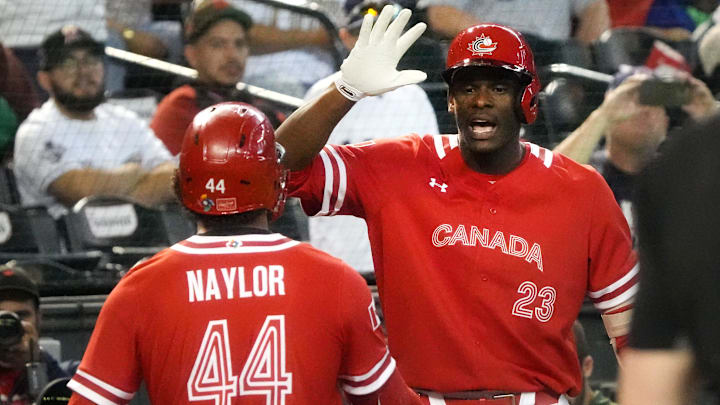 Canada's Bo Naylor (44) is congratulated by teammate Denzel Clarke (23) after hitting a home run against Mexico during their World Baseball Classic game at Chase Field in Phoenix on March 15, 2023.

Baseball World Baseball Classic Final Day