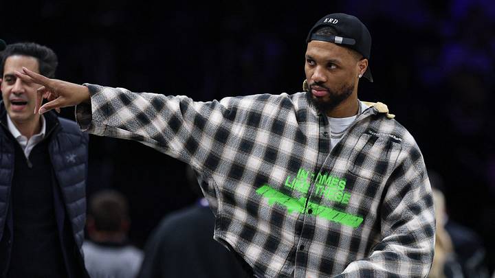 Mar 16, 2026; Brooklyn, New York, USA;  Portland Trail Blazers guard Damian Lillard (0) gestures to fans during the second half of the NBA game between the Brooklyn Nets and the Trail Blazers at Barclays Center. Mandatory Credit: Vincent Carchietta-Imagn Images