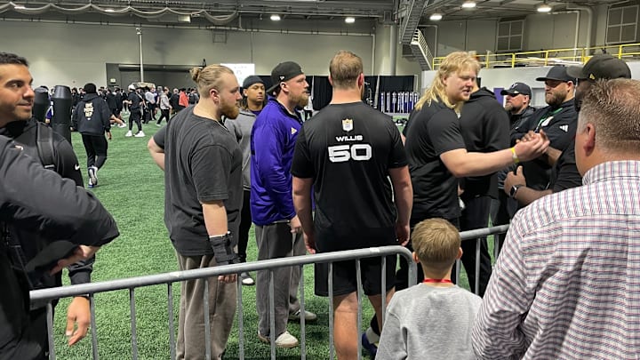 John Mills circulates during UW Pro Day. 