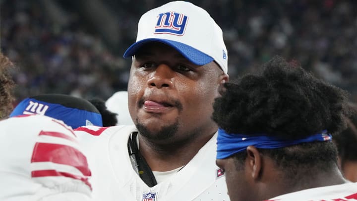 East Rutherford, NJ -- August 24, 2024 -- Dexter Lawrence of the Giants on the sidelines in the first half. The New York Giants and New York Jets meet at MetLife Stadium in the final preseason game of the 2024 season for both teams. East Rutherford, NJ -- August 24, 2024 -- Dexter Lawrence of the Giants on the sidelines in the first half. The New York Giants and New York Jets meet at MetLife Stadium in the final preseason game of the 2024 season for both teams.