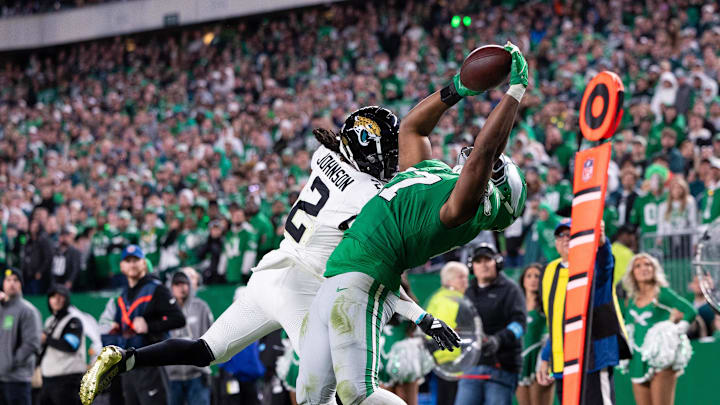 Nov 3, 2024; Philadelphia, Pennsylvania, USA; Philadelphia Eagles linebacker Nakobe Dean (17) intercepts the ball past Jacksonville Jaguars running back D'Ernest Johnson (2) late in the fourth quarter at Lincoln Financial Field. Mandatory Credit: Bill Streicher-Imagn Images