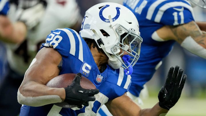Indianapolis Colts running back Jonathan Taylor (28) rushes the ball Sunday, Sept. 22, 2024, during a game against the Chicago Bears at Lucas Oil Stadium in Indianapolis. He did not play against the Jacksonville Jaguars on Oct. 6, 2024.