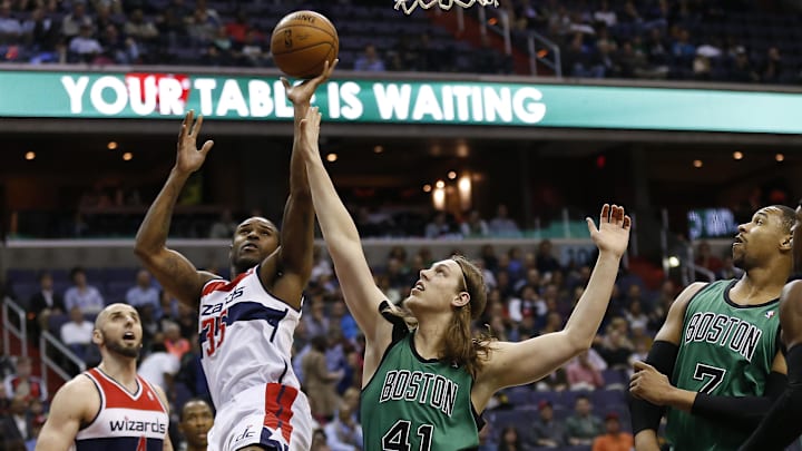 Apr 2, 2014; Washington, DC, USA; Washington Wizards forward Trevor Booker (35) shoots the ball as Boston Celtics center Kelly Olynyk (41) defends in the first quarter at Verizon Center. Mandatory Credit: Geoff Burke-Imagn Images